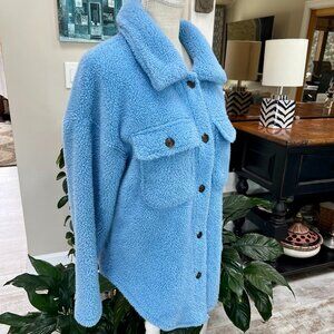 Beautiful Sky Blue Cisono Outerwear Collection